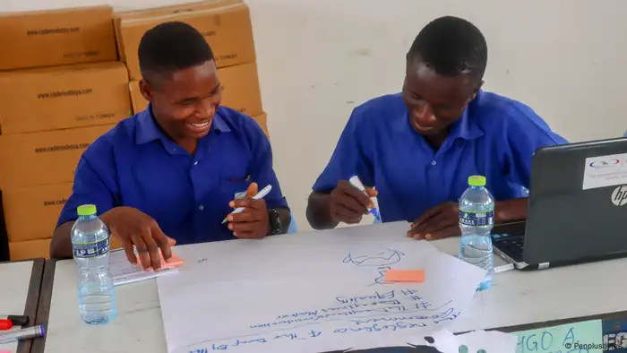 House of Grace School for the Deaf students write hashtags for a presentation