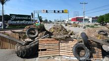 General view of a blocked street during an indefinite strike hold by unions opposing the government of Bolivian President Luis Arce to demand a census for 2023, in Santa Cruz, Bolivia, on October 24, 2022. (Photo by AIZAR RALDES / AFP) (Photo by AIZAR RALDES/AFP via Getty Images)