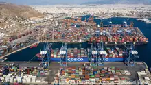 (200530) -- BEIJING, May 30, 2020 (Xinhua) -- Aerial photo taken on Sept. 6, 2019 shows a cargo ship of COSCO SHIPPING Lines transporting Italian products to participate in the 2019 China International Import Expo (CIIE) berths at the Port of Piraeus in Greece. (Photo by Lefteris Partsalis/Xinhua)