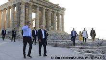  October 27, 2022, Athens, Greece: Greek Prime Minister Kyriakos Mitsotakis and German Chancellor Olaf Scholz talk each other as they walk in front of the ancient Parthenon Temple at the Acropolis hill during a visit, in Athens. Athens Greece - ZUMAe114 20221027_zaa_e114_002 Copyright: xEurokinissix