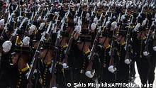 Greek army soldiers attend a military parade in Thessaloniki, on October 28, 2022, during the celebrations marking Greece's National Oxi (No) Day, commemorating Greece's refusal to accept the ultimatum advanced by fascist Italy in 1940 during World War II. (Photo by Sakis MITROLIDIS / AFP) (Photo by SAKIS MITROLIDIS/AFP via Getty Images)