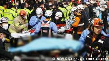 (221030) -- SEOUL, Oct. 30, 2022 (Xinhua) -- Rescuers work at the site of a stampede accident in Itaewon, a district of Seoul, South Korea, Oct. 30, 2022. At least 146 people were killed and 150 others injured in a stampede accident that occurred Saturday night at Itaewon, a district of the South Korean capital Seoul, during Halloween gatherings, local authorities said early Sunday morning. (NEWSIS via Xinhua)