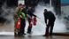 Members of Britain's military and Border Force put out a fire at the migrant processing center Members of Britain's military and Border Force put out a fire at the migrant processing center