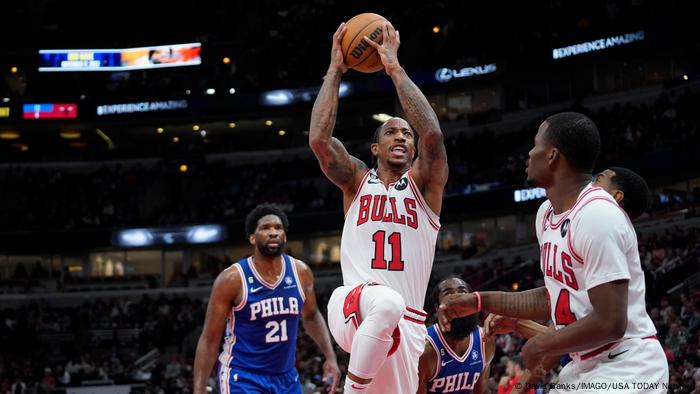 Chicago Bulls' DeMar DeRozan makes a ball-in-hand shot for the basket during the game against Philadelphia