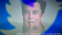 Elon Musk, CEO von Tesla und SpaceX, hinter den Silhouetten des Twitter-Logos. Musk hat offiziell die Kontrolle über das soziale Netzwerk übernommen und bereits Führungskräfte entlassen. «Der Vogel ist freigelassen», twitterte er und kündigte weniger Kontrolle über Inhalte auf der Plattfrom an. +++ dpa-Bildfunk +++