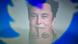 The face of tech mogul Elon Musk is visible along with Twitter's logo The face of tech mogul Elon Musk is visible along with Twitter's logo