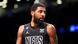 Brooklyn Nets guard Kyrie Irving looks out during the first half of an NBA basketball game against the Indiana Pacers Brooklyn Nets guard Kyrie Irving looks out during the first half of an NBA basketball game against the Indiana Pacers