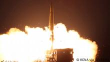 A missile launch is seen at an undisclosed location in North Korea, in this undated photo released on October 10, 2022 by North Korea's Korean Central News Agency (KCNA). KCNA via REUTERS ATTENTION EDITORS - THIS IMAGE WAS PROVIDED BY A THIRD PARTY. REUTERS IS UNABLE TO INDEPENDENTLY VERIFY THIS IMAGE. NO THIRD PARTY SALES. SOUTH KOREA OUT. NO COMMERCIAL OR EDITORIAL SALES IN SOUTH KOREA.