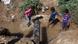 Children playing in muddy water