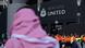 A man with a Saudi Arabian headdress pases by the ground before an English Premier League soccer match between Newcastle and Tottenham Hotspur A man with a Saudi Arabian headdress pases by the ground before an English Premier League soccer match between Newcastle and Tottenham Hotspur