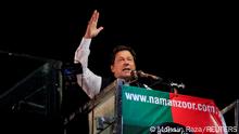 FILE PHOTO: Ousted Pakistani Prime Minister Imran Khan gestures as he addresses supporters during a rally, in Lahore, Pakistan April 21, 2022. REUTERS/Mohsin Raza//File Photo