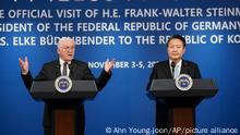 German President Frank-Walter Steinmeier, left, speaks as South Korean President Yoon Suk Yeol listens during their joint news conference at the presidential office in Seoul, South Korea, Friday, Nov. 4, 2022. (AP Photo/Ahn Young-joon)