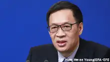 中国央行前副行长出庭受审