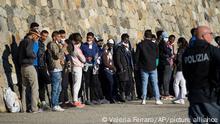 Migrants disembark from the German humanitarian ship Rise Above docked in the southern Italian port town of Reggio Calabria, Tuesday, Nov. 8, 2022.German humanitarian group Mission Lifeline said its ship docked in southern Italy early Tuesday and disembarked the 89 people it had rescued in the central Mediterranean. (AP Photo/Valeria Ferraro)