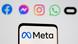 The Meta logo is seen on smartphone in front of displayed logos of Facebook, Messenger, Instagram, WhatsApp, Oculus. The Meta logo is seen on smartphone in front of displayed logos of Facebook, Messenger, Instagram, WhatsApp, Oculus.