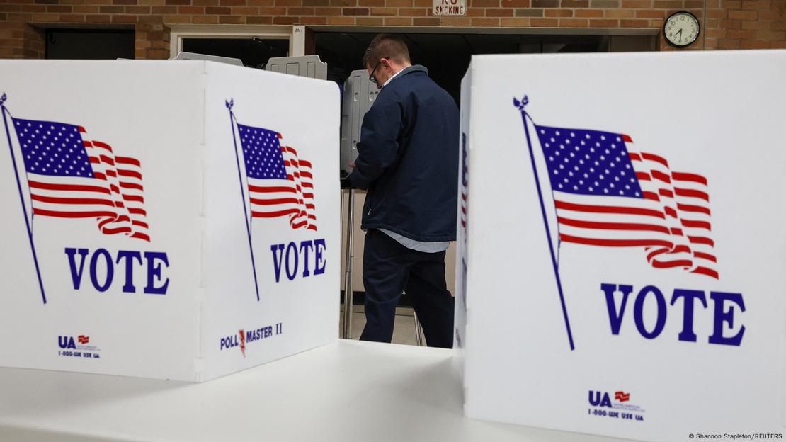 A man at a voting booth in the US midterms