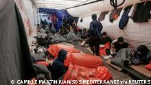 FILE PHOTO: Migrants sleep on deck of NGO rescue ship 'Ocean Viking', in the Mediterranean Sea, November 6, 2022. Camille Martin Juan/Sos Mediterranee/Handout via REUTERS ATTENTION EDITORS THIS IMAGE HAS BEEN SUPPLIED BY A THIRD PARTY. NO RESALES. NO ARCHIVES/File Photo
