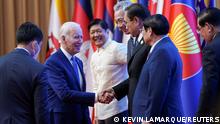 U.S. President Joe Biden greets other leaders during the 2022 ASEAN summit in Phnom Penh, Cambodia, November 12, 2022. REUTERS/Kevin Lamarque