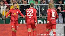 Soccer Football - Bundesliga - Werder Bremen v RB Leipzig - Weser-Stadion, Bremen, Germany - November 12, 2022 RB Leipzig's Andre Silva celebrates scoring their first goal with teammates REUTERS/Fabian Bimmer DFL REGULATIONS PROHIBIT ANY USE OF PHOTOGRAPHS AS IMAGE SEQUENCES AND/OR QUASI-VIDEO.