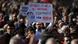 A healthcare worker holds a sign during a protest in Madrid addressed to regional president Isabel Diaz Ayuso reading "Ayuso, take note, my contract is sh*t" A healthcare worker holds a sign during a protest in Madrid addressed to regional president Isabel Diaz Ayuso reading "Ayuso, take note, my contract is sh*t"