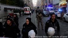 Security and ambulances at the scene after an explosion on Istanbul's popular pedestrian Istiklal Avenue, Sunday, Nov. 13, 2022. An explosion on one of Istanbul's most popular pedestrian thoroughfares killed four people and injured more than 30 on Sunday, authorities said. The cause of the blast on Istiklal Avenue was not immediately clear. Five prosecutors were assigned to investigate the explosion, state-run Anadolu news agency said.(AP Photo/Francisco Seco)