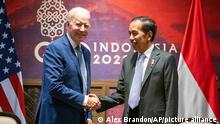 U.S. President Joe Biden and Indonesian President Joko Widodo shake hands before their meeting on the sidelines of the G20 summit meeting, Monday, Nov. 14, 2022, in Bali, Indonesia. (AP Photo/Alex Brandon)