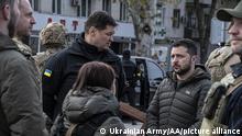 KHERSON OBLAST, UKRAINE - NOVEMBER 14: (----EDITORIAL USE ONLY - MANDATORY CREDIT - 'UKRAINIAN ARMY / HANDOUT' - NO MARKETING NO ADVERTISING CAMPAIGNS - DISTRIBUTED AS A SERVICE TO CLIENTS----) Ukrainian President Vladimir Zelensky meets Ukrainian soldiers and citizens after Russian retreat in Kherson Oblast, Ukraine on November 14, 2022. Ukrainian Army / Anadolu Agency
