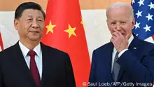 US President Joe Biden (R) and China's President Xi Jinping (L) meet on the sidelines of the G20 Summit in Nusa Dua on the Indonesian resort island of Bali on November 14, 2022. (Photo by SAUL LOEB / AFP) (Photo by SAUL LOEB/AFP via Getty Images)