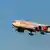 An Air India Boeing 777-300ER jet (VT-ALQ) airborne