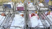 TOPSHOT - This photo taken on September 19,2022 shows newborn babies inside a ward at the Tambak Maternity hospital in Jakarta. - The global population will breach the symbolic level of 8 billion on November 15, according to the UN. The milestone comes as questions are increasingly being raised about the measures needed to adapt to global warming, as well as about how humanity consumes Earths resources. (Photo by Adek BERRY / AFP) (Photo by ADEK BERRY/AFP via Getty Images)