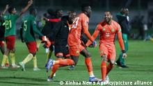 (220330) -- BLIDA, March 30, 2022 (Xinhua) -- Cameroon's players celebrate after winning the second leg of the 2022 FIFA World Cup African Qualifiers football match between Algeria and Cameroon in Blida, Algeria, March 29, 2022. (Str/Xinhua)