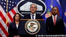 U.S. Attorney General Merrick Garland is flanked by Deputy Attorney General Lisa Monaco and U.S. Attorney for the District of Columbia Matthew Graves as he announces his appointment of Jack Smith as a special counsel for the investigations of former President Donald Trump, in the briefing room of the U.S. Justice Department in Washington, U.S., November 18, 2022. REUTERS/Evelyn Hockstein