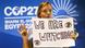 "We are watching", los estamos observando, dice pancarta que sostiene activista en la COP27 "We are watching", los estamos observando, dice pancarta que sostiene activista en la COP27