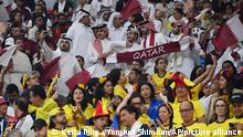 Supectators wait for the start of the Opening Match of the World Cup between Qatar and Ecuador at Al Bayt Stadium in Al Khor City on Nov. 20, 2022. ( The Yomiuri Shimbun via AP Images )
