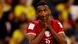 Mohammed Muntari holds his hands over his face during Qatar's loss to Ecuador in the World Cup Mohammed Muntari holds his hands over his face during Qatar's loss to Ecuador in the World Cup