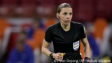 Referee Stephanie Frappart watches the play during the World Cup 2022 group G qualifying soccer match between The Netherlands and Latvia at the Johan Cruyff ArenA in Amsterdam, Netherlands, Sunday, March 28, 2021. (AP Photo/Peter Dejong)