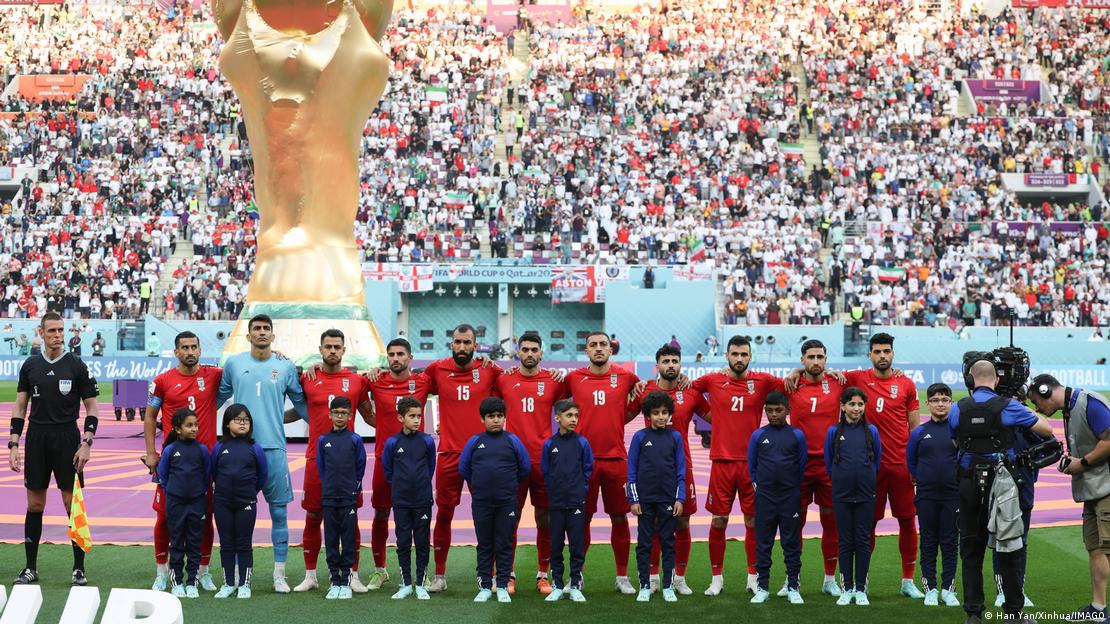 Iran's players stand together, united in not signing the country's national anthem