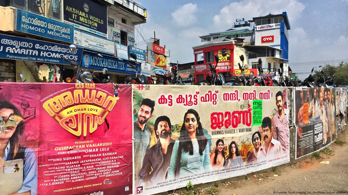 Malayalam film posters along the roadside in the city of Thiruvananthapuram (Trivandrum), Kerala