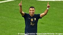 TOPSHOT - France's forward #10 Kylian Mbappe celebrates scoring his team's third goal during the Qatar 2022 World Cup Group D football match between France and Australia at the Al-Janoub Stadium in Al-Wakrah, south of Doha on November 22, 2022. (Photo by Anne-Christine POUJOULAT / AFP) (Photo by ANNE-CHRISTINE POUJOULAT/AFP via Getty Images)