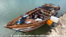 October 14, 2022: A wooden Cuban migrant boat is tied to a sea wall in the Fills area of Indian Key in the Florida Keys on Friday, Oct. 12, 2022. (Credit Image: © David Goodhue/Miami Herald via ZUMA Press Wire