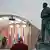 Estatua de Fidel Castro a la derecha. A la izquierda, un escenario con Putin y Díaz Canel ante un estrado de oradores. 