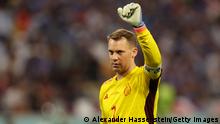DOHA, QATAR - NOVEMBER 23: Manuel Neuer of Germany reacts during the FIFA World Cup Qatar 2022 Group E match between Germany and Japan at Khalifa International Stadium on November 23, 2022 in Doha, Qatar. (Photo by Alexander Hassenstein/Getty Images)