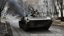 23.11.2022+++ BAKHMUT, UKRAINE - NOVEMBER 23: Ukrainian soldiers are seen in a tank as military mobility proceeds in Bakhmut where the war against Russia continues, located Donetsk Oblast, Ukraine on November 23, 2022. Metin Aktas / Anadolu Agency