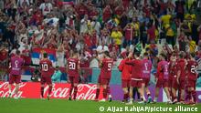 Serbia's players greet their fans at the end of the World Cup group G soccer match between Brazil and Serbia, at the Lusail Stadium in Lusail, Qatar, Thursday, Nov. 24, 2022. (AP Photo/Aijaz Rahi)