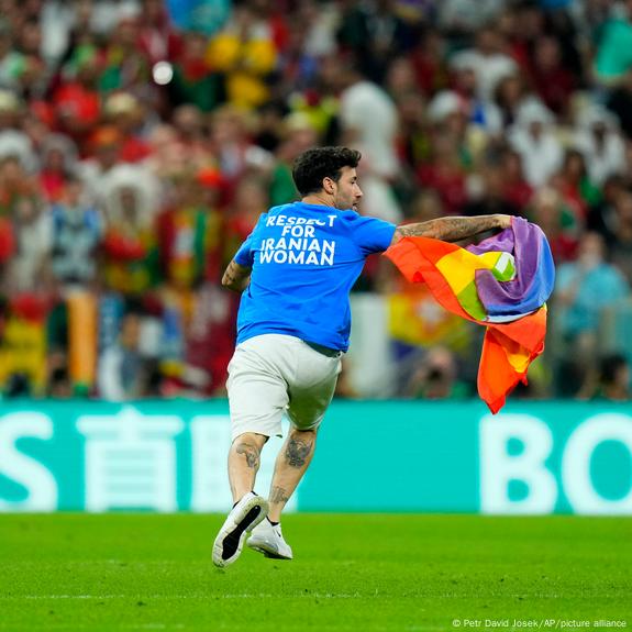 Respect For Iranian Women' protester invades pitch at World Cup