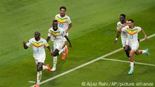 Senegal's Kalidou Koulibaly, left, celebrates after scoring during the World Cup group A soccer match between Ecuador and Senegal, at the Khalifa International Stadium in Doha, Qatar, Tuesday, Nov. 29, 2022. (AP Photo/Aijaz Rahi)