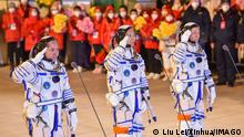  221129 -- JIUQUAN, Nov. 29, 2022 -- A see-off ceremony for three Chinese astronauts of the Shenzhou-15 manned space mission is held at the Jiuquan Satellite Launch Center in northwest China, Nov. 29, 2022. Astronauts Fei Junlong C, Deng Qingming R, and Zhang Lu have received years of arduous training for this six-month mission, during which the construction of China s space station will be officially completed. CHINA-JIUQUAN-SHENZHOU-15-ASTRONAUTS-SEE-OFF CEREMONY CN LiuxLei PUBLICATIONxNOTxINxCHN