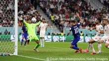 DOHA, QATAR - NOVEMBER 29: Christian Pulisic of United States scores their team's first goal during the FIFA World Cup Qatar 2022 Group B match between IR Iran and USA at Al Thumama Stadium on November 29, 2022 in Doha, Qatar. (Photo by Dean Mouhtaropoulos/Getty Images)