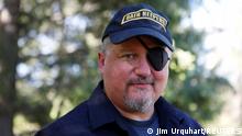 FILE PHOTO: Oath Keepers militia founder Stewart Rhodes poses during an interview session in Eureka, Montana, U.S. June 20, 2016. Picture taken June 20, 2016. REUTERS/Jim Urquhart/File Photo