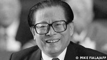 (FILES) In this file photo taken on October 12, 1992, General Secretary of the Chinese Communist Party Jiang Zemin smiles during the CCP congress in Beijing. - China's former leader Jiang Zemin, who steered the country through a transformational era from the late 1980s and into the new millennium, died November 30, 2022 at the age of 96, Xinhua reported. (Photo by Mike FIALA / AFP)